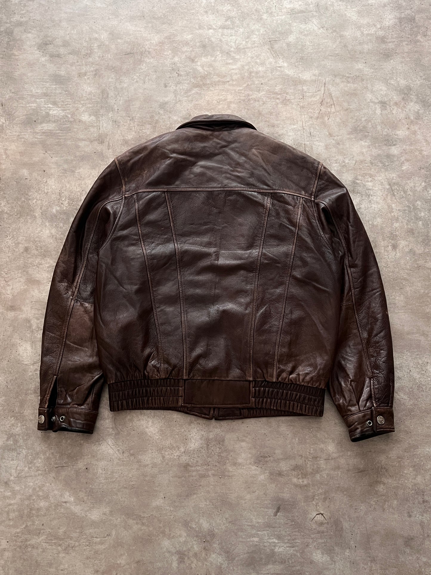 BROWN LEATHER JACKET (S)