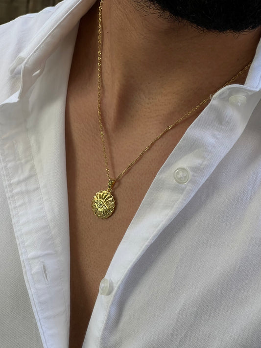 Ojo de acero inoxidable color oro con incrustaciones