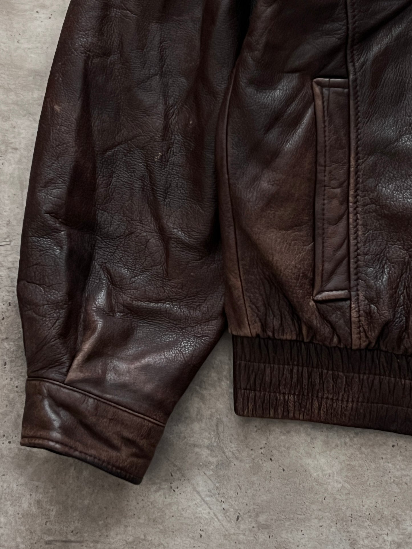 BROWN LEATHER JACKET (S)