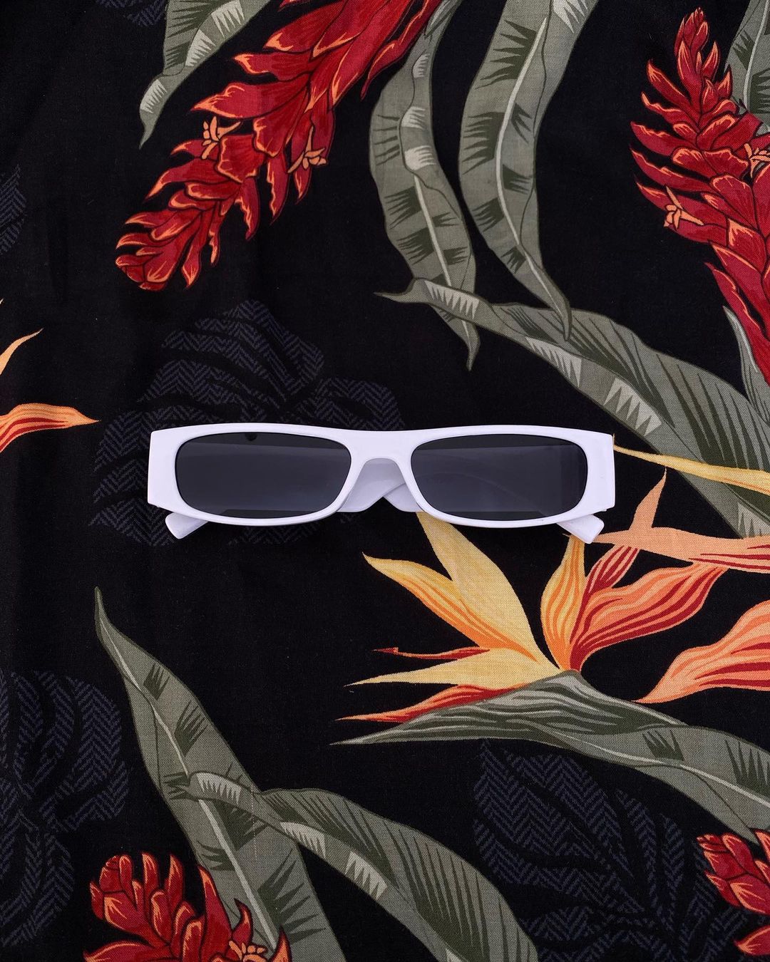 Gafas blancas micas oscuras