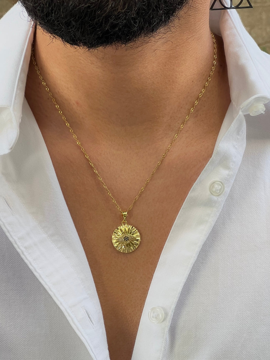 Gold-color stainless steel eye with inlay