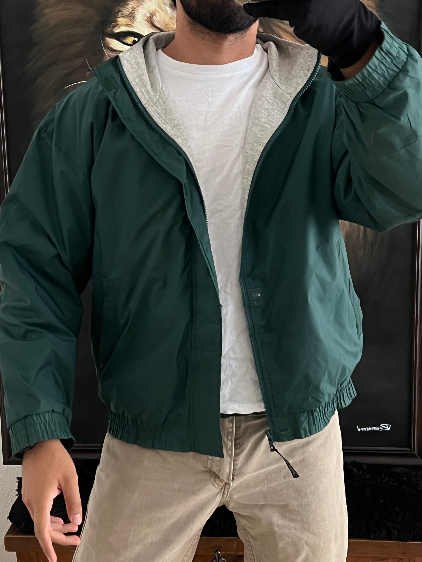 Green windbreaker (M)