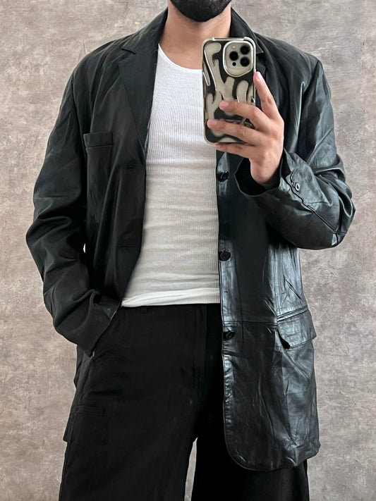 Gabardina de piel (L)