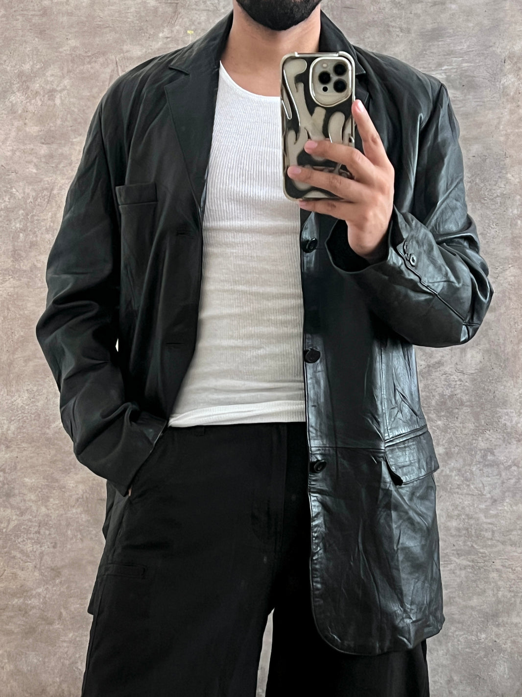 Gabardina de piel (L)