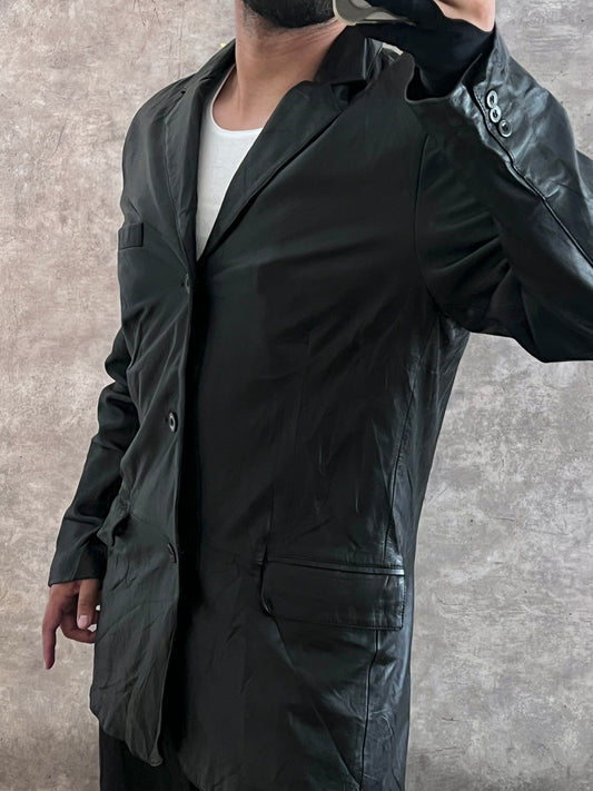 Gabardina de piel (L)