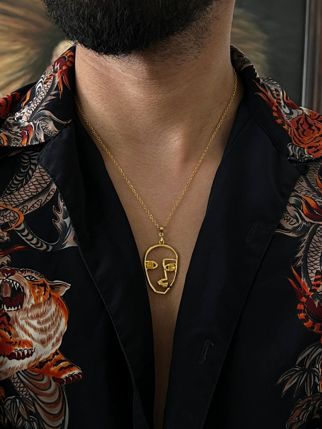 GOLD FACE NECKLACE